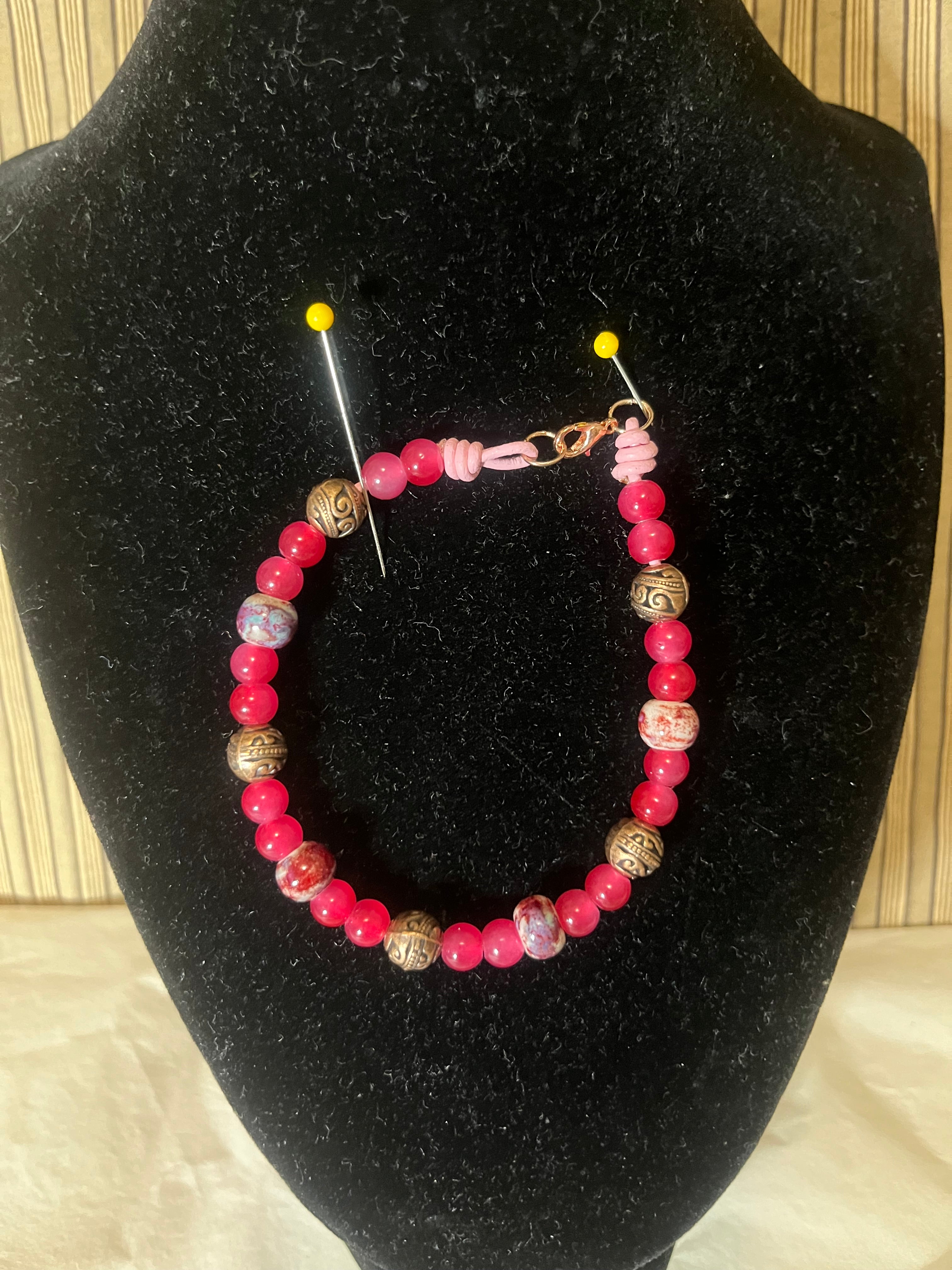 Bracelet Burgundy tone ceramic, metal, glass beads, leather