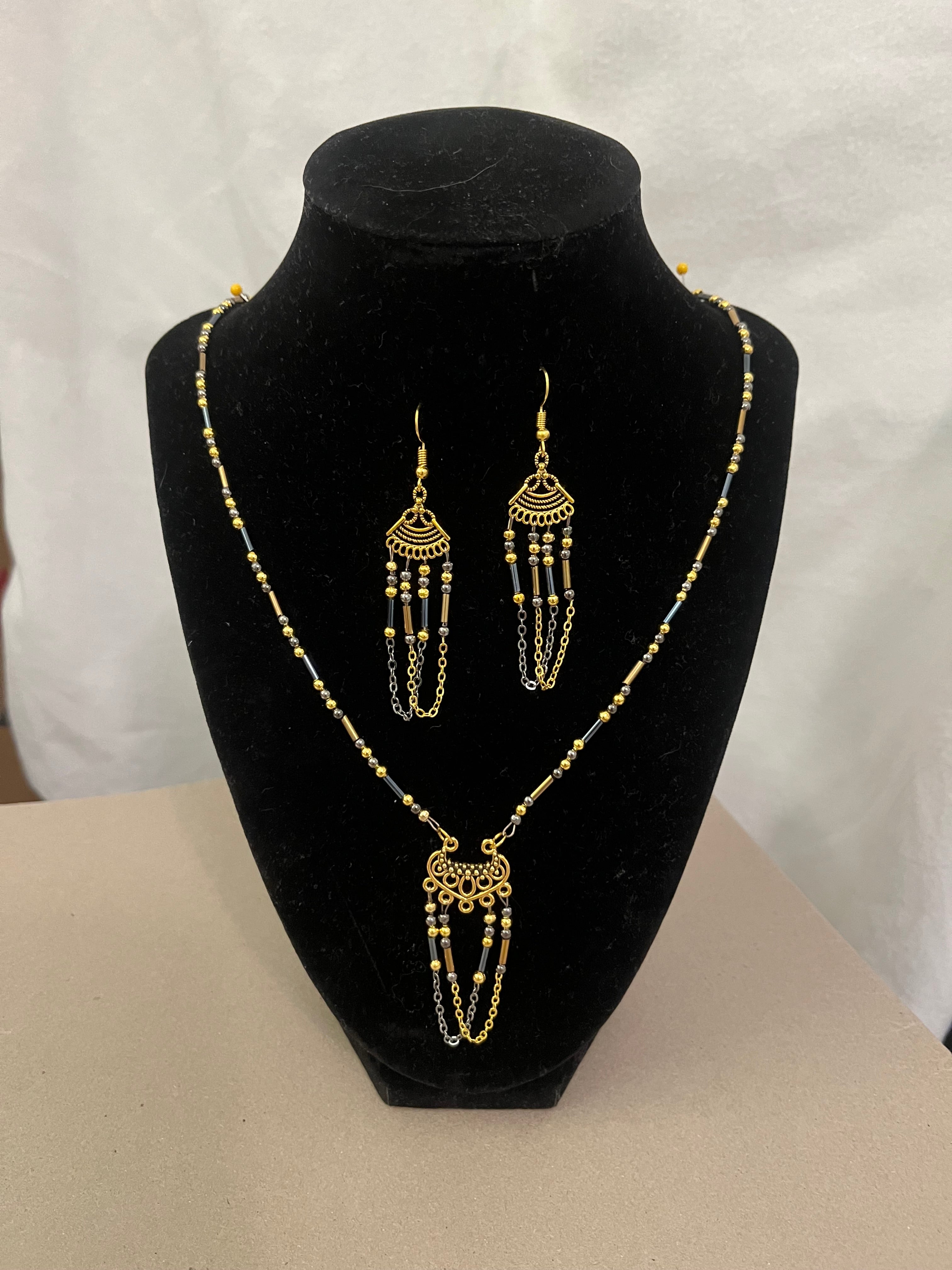 Necklace & Earrings of gold, brown & nickel color beads with Pendant, & Earrings