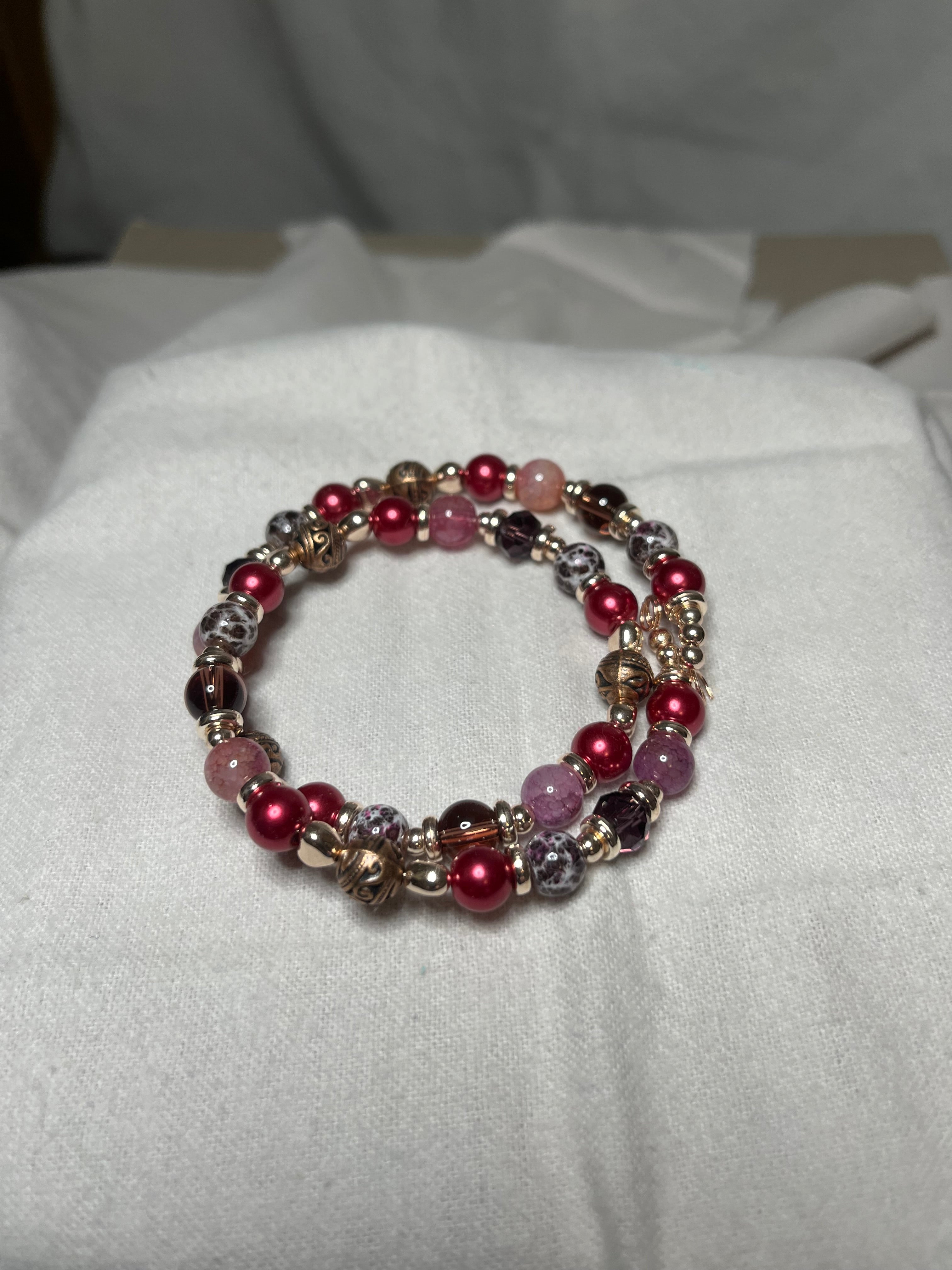 Memory Wire Bracelet with pink tones & gold beads & findings